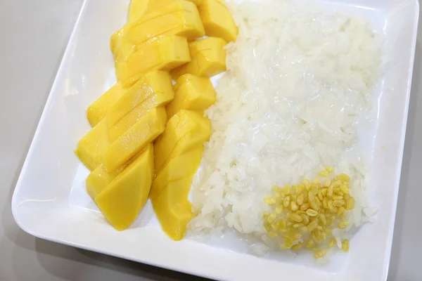 Thai style dessert, sticky rice eat with mangoes