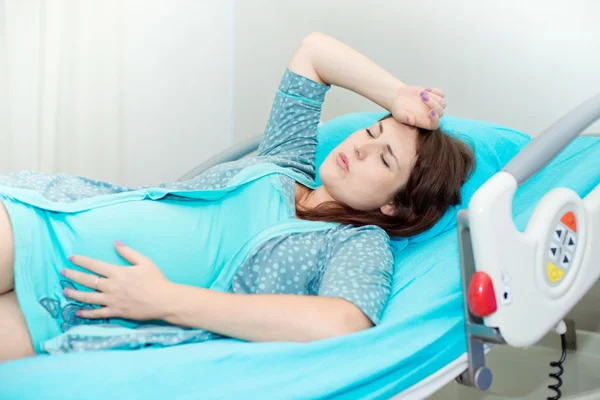 Pregnant woman in childbirth