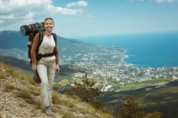 Young woman hiking smiling happy portrait.