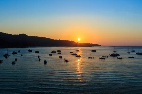 Sunrise on the sea with boat