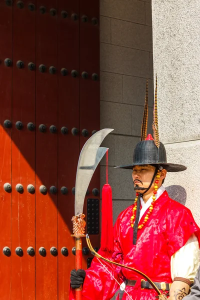 Guard stands at the entry gate