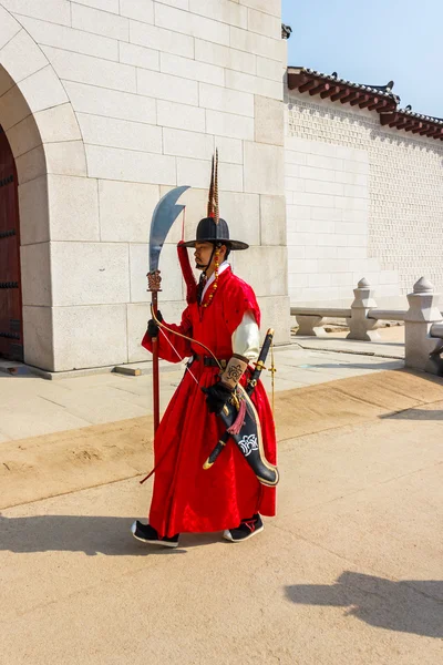 Guard stands at the entry gate