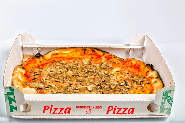 Takeaway Italian pizza with mushrooms