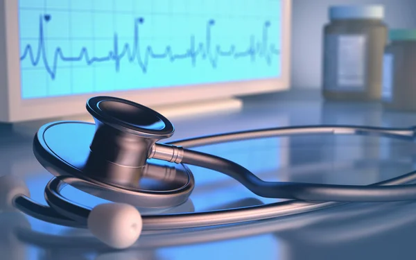 Stethoscope in front of the heartbeat monitor.