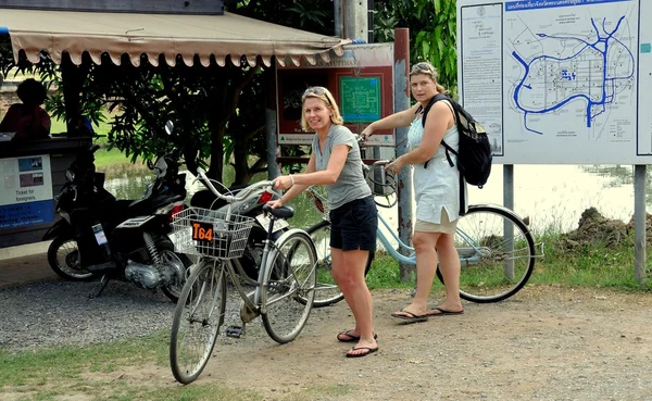 Ayutthaya, Thailand:Two Women Touring on Bicycles