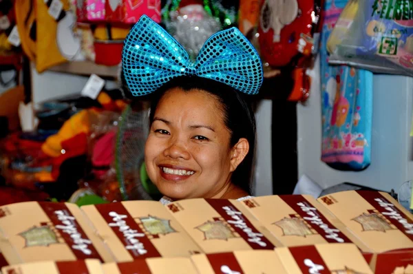 Ayutthaya, Thailand: Vendor with Blue Hair Bow