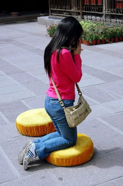 Chengdu, China: Woman Praying at Wenshu Temple