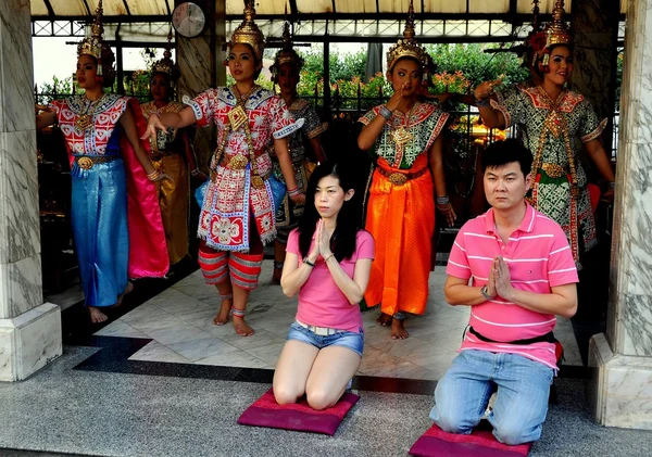 Bangkok, Thailand: People Praying at Erawan Shrine