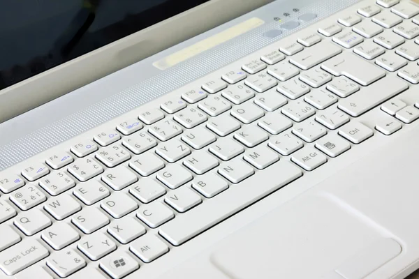Detail of white Key Board Laptop Computer