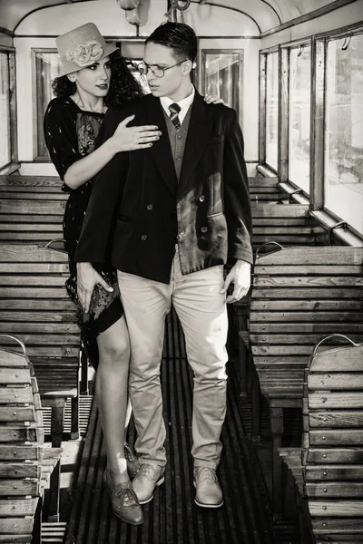 Beautiful composition of romantic fashion couple standing inside