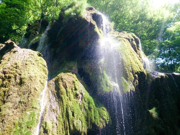 Close up of beautiful and fantastic waterfall in mountain