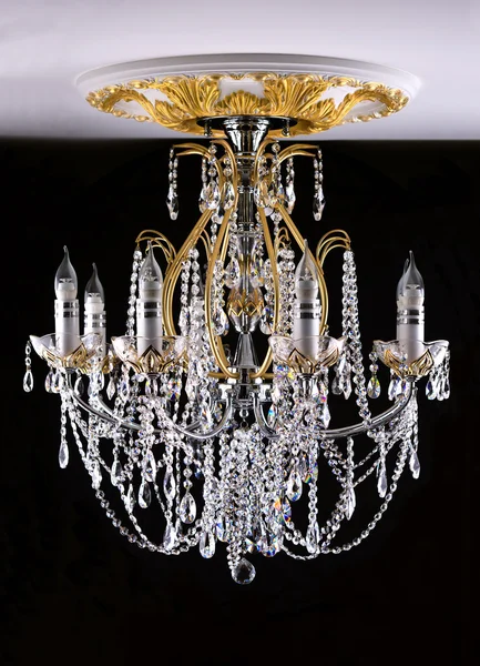 Classical style chandelier on ceiling