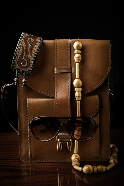 Retro accessories. Bag, jewelry and sunglasses