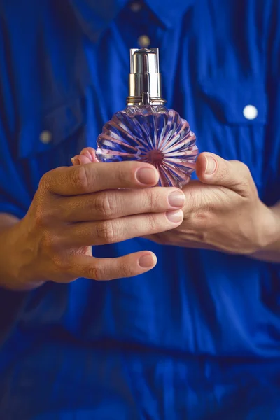 Perfume in women's hands