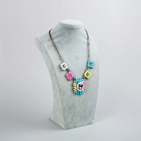 Woman\'s necklace of colored stones