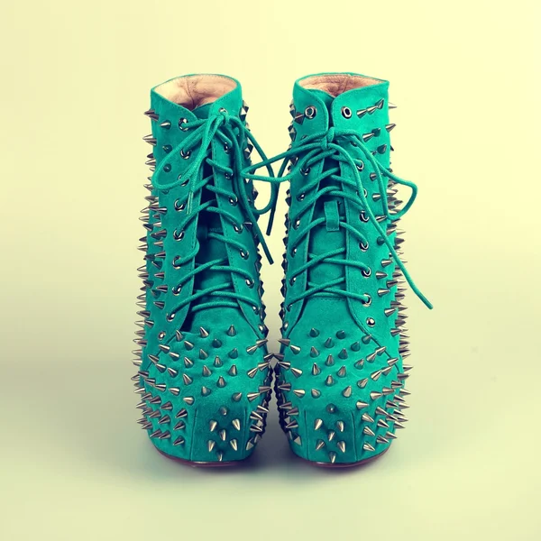 Female blue shoes with spikes