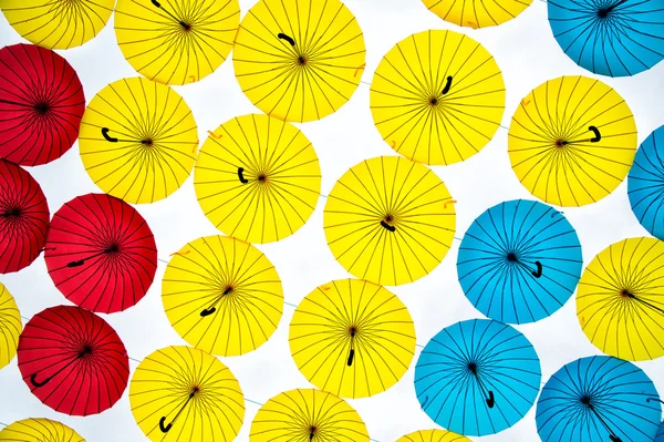 Different colors umbrellas background