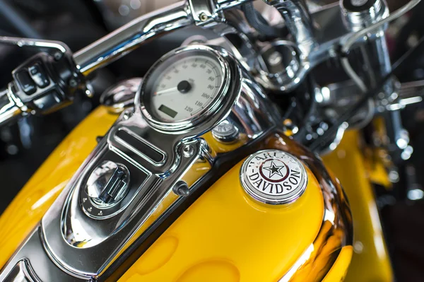 Harley Davidson motorcycle dashboard and speedometer detail.