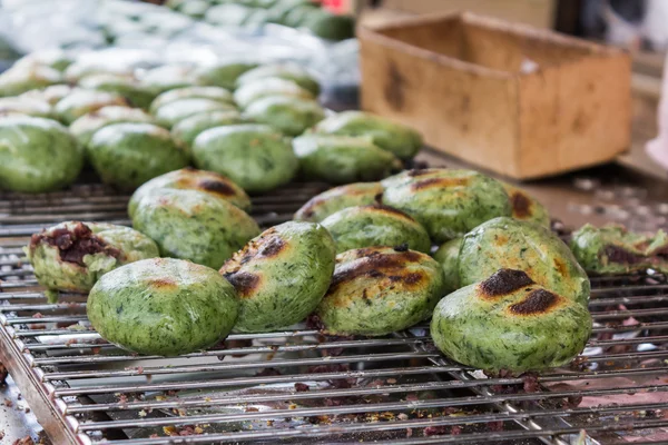 Roasted green tea steamed stuff bun on oven .