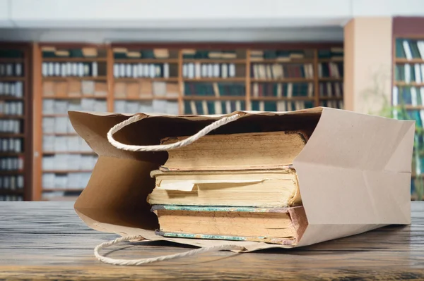 Paper bag with books