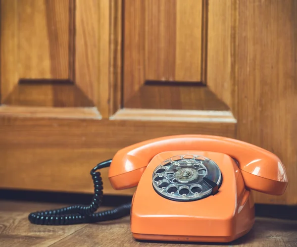 Vintage phone on floor