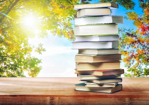 A stack of books on table