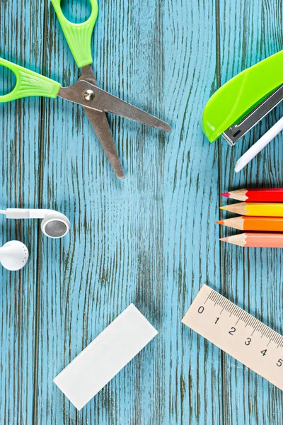 School items on wooden table
