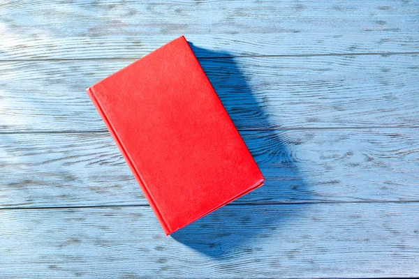 Red book on table
