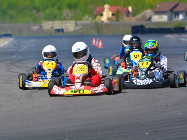 PREJMER, BRASOV, ROMANIA - MAY 3: Unknown pilots competing in National Karting Championship Dunlop 2015, on May 3, 2015 in Prejmer, Romania