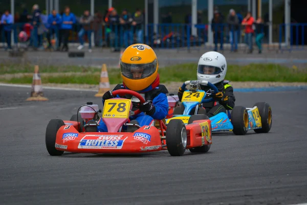 PREJMER, BRASOV, ROMANIA - MAY 3: Unknown pilots competing in National Karting Championship Dunlop 2015, on May 3, 2015 in Prejmer, Brasov, Romania