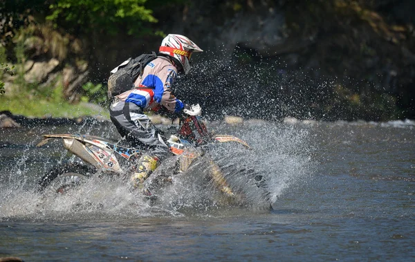 SIBIU, ROMANIA - JULY 18: Unknown competing in Red Bull ROMANIACS Hard Enduro Rally with a KTM 300  motorcycle. The hardest enduro rally in the world.