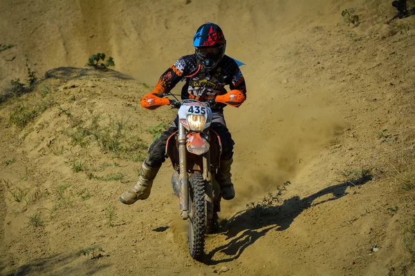 SIBIU, ROMANIA - JULY 18: Joseph Till competing in Red Bull ROMANIACS Hard Enduro Rally with a Madscrap motorcycle. The hardest enduro rally in the world. July 18, 2015 in Sibiu, Romania.
