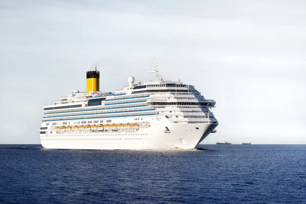 Concordia-class cruise liner entering the port