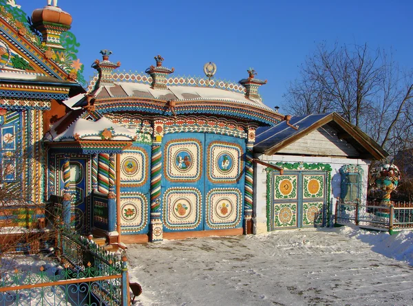 KUNARA, SVERDLOVSK REGION, RUSSIA - November 8, 2011: Photo of Bright, colorful gates. Detail of the house.