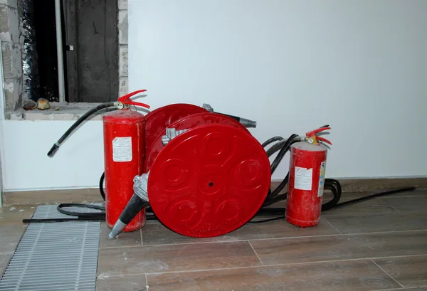 Moscow, Russia, August 23, 2014, fire extinguishers located in the unfinished room of an office building 