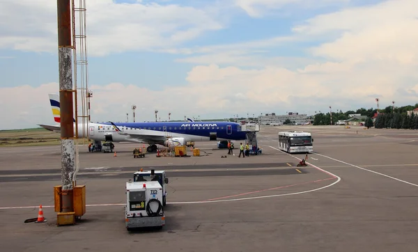 July 3, 2015, Chisinau, Moldova, airplane and trucks, producing preparations for takeoff