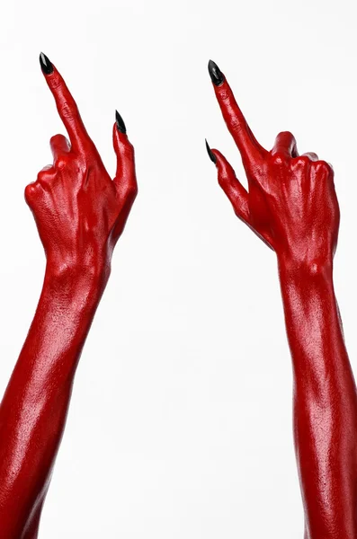 Red Devil's hands, red hands of Satan, Halloween theme, white background, isolated