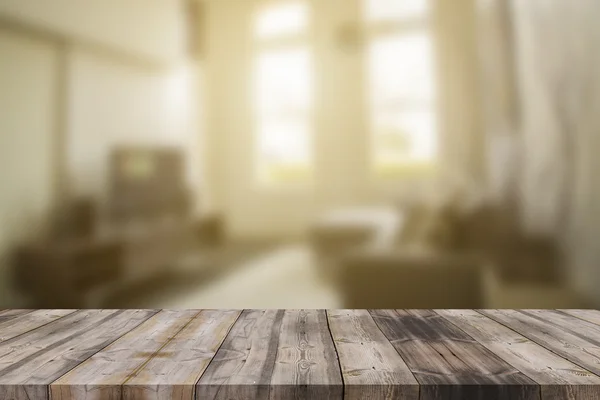 Wood table top (as house) on blur house background - can be used