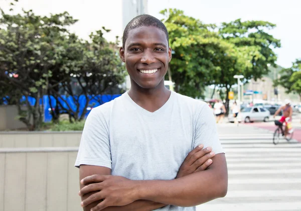 African american guy with crossed arms outdoor