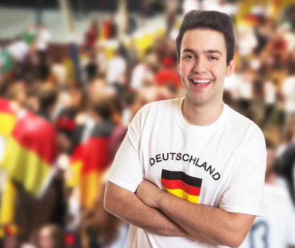 Attractive fan in german jersey  with other fans