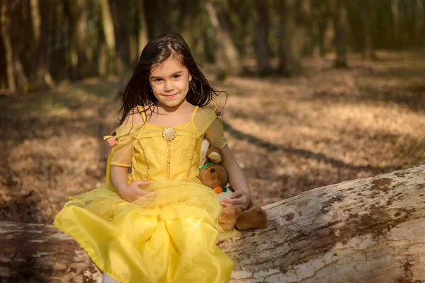 Girl in yellow princess dress