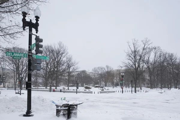 Snow-covered empty crossroad