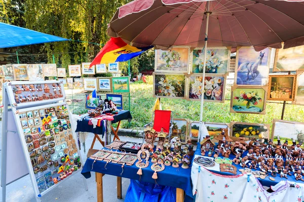 Tourists and locals looking at the stalls at Chisinau flea marke