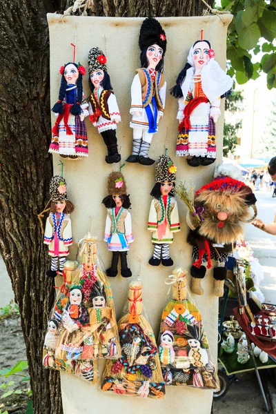 Stuffed souvenir dolls at flea market in Chisinau, Moldova. At t