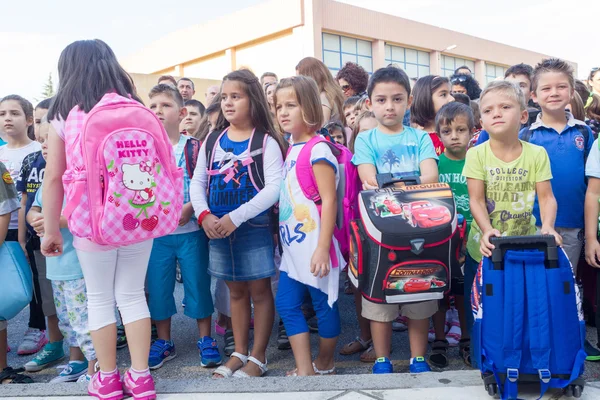 Students with their backpacks. First Day of school for the stude