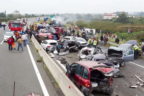 large truck crashed into a number of cars and 4 people were kil