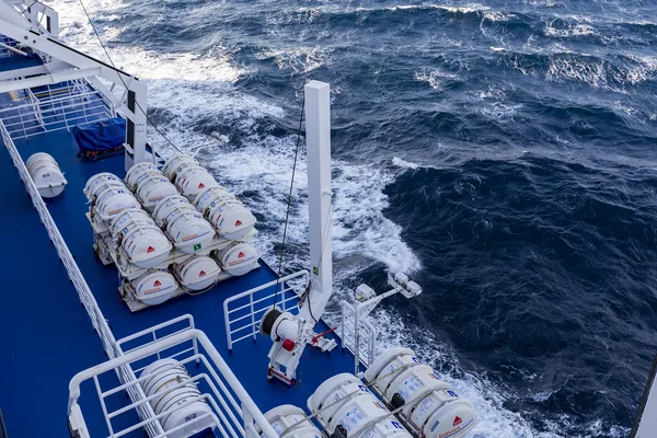 Barrels containing emergency liferafts on the ship, in Greece.