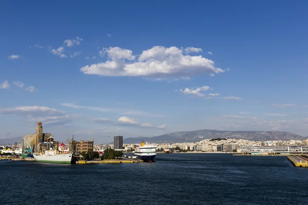 Ferry boats, cruise ships docking at the port of Piraeus, Greece