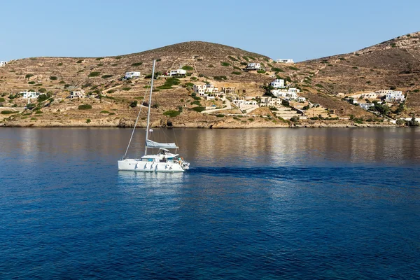 View of the ocean with boat of the Greek island of Ios island, C