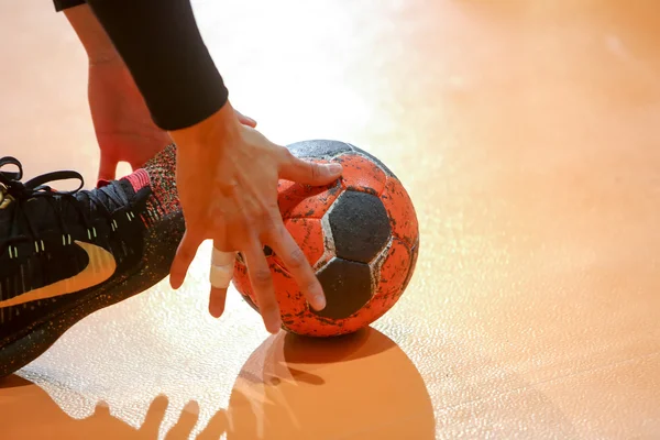 Undefined hands holding a ball prior to the Greek Women Cup Fina